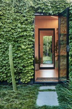Writer’s Shed by Matt Gibson is a Melbourne garden studio covered in ivy