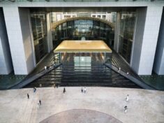 Foster + Partners surrounds Abu Dhabi Apple Store with stepped waterfall