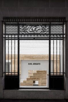 Halleroed inserts sculptural travertine display plinths in Axel Arigato’s Paris store