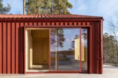 A Tiny Cabin in Rural Sweden Pops With Red Pinewood
