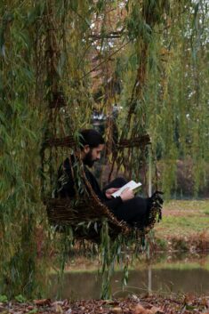 Gerardo Osio weaves chair into weeping willow tree on the Dommel river