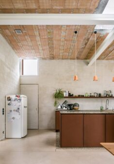 Graux & Baeyens creates flexible living areas inside updated Belgian bungalow