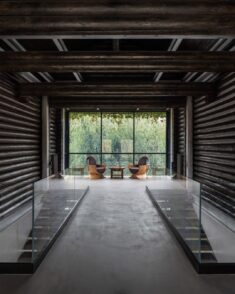 Relogged house by Balbek Bureau reinterprets traditional log cabins