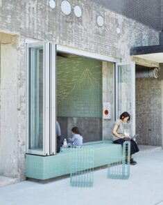 Schemata Architects clads Komaeyu bathhouse in “patchwork” of turquoise tiles