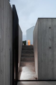 João Mendes Ribeiro slots concrete wine cellar below gabled house in rural Portugal