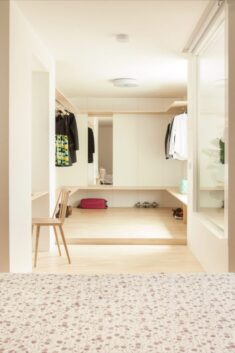 Ten homes with walk-in wardrobes that store clothes in interesting ways