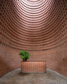 Perforated brickwork wraps Premier Office in Vietnam by Tropical Space