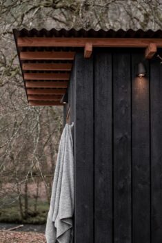 Out of the Valley clads prefabricated Forest Sauna in charred wood