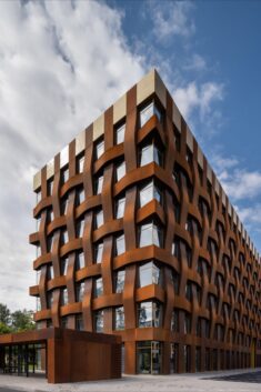 Sergei Tchoban uses Corten steel to create huge basket-weave facade