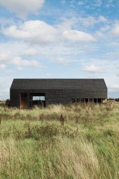 A Pair of English Barns Hide Unabashedly Bold and Budget-Friendly Minimalist Interiors