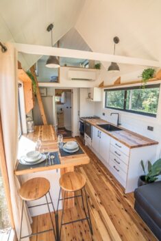 Sojourner by Häuslein Tiny House Co. With Slide-Out Living Area